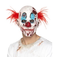 Clownsmaske mit verbranntem Gesicht